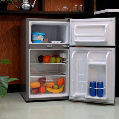 Geepas 84L Double Door Defrost Refrigerator – GRF1259GPE, Rapid Cooling, Tropic Type, CFC-Free, Metallic Grey