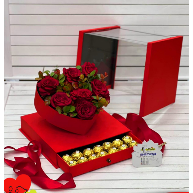 Red flower in box and choclate